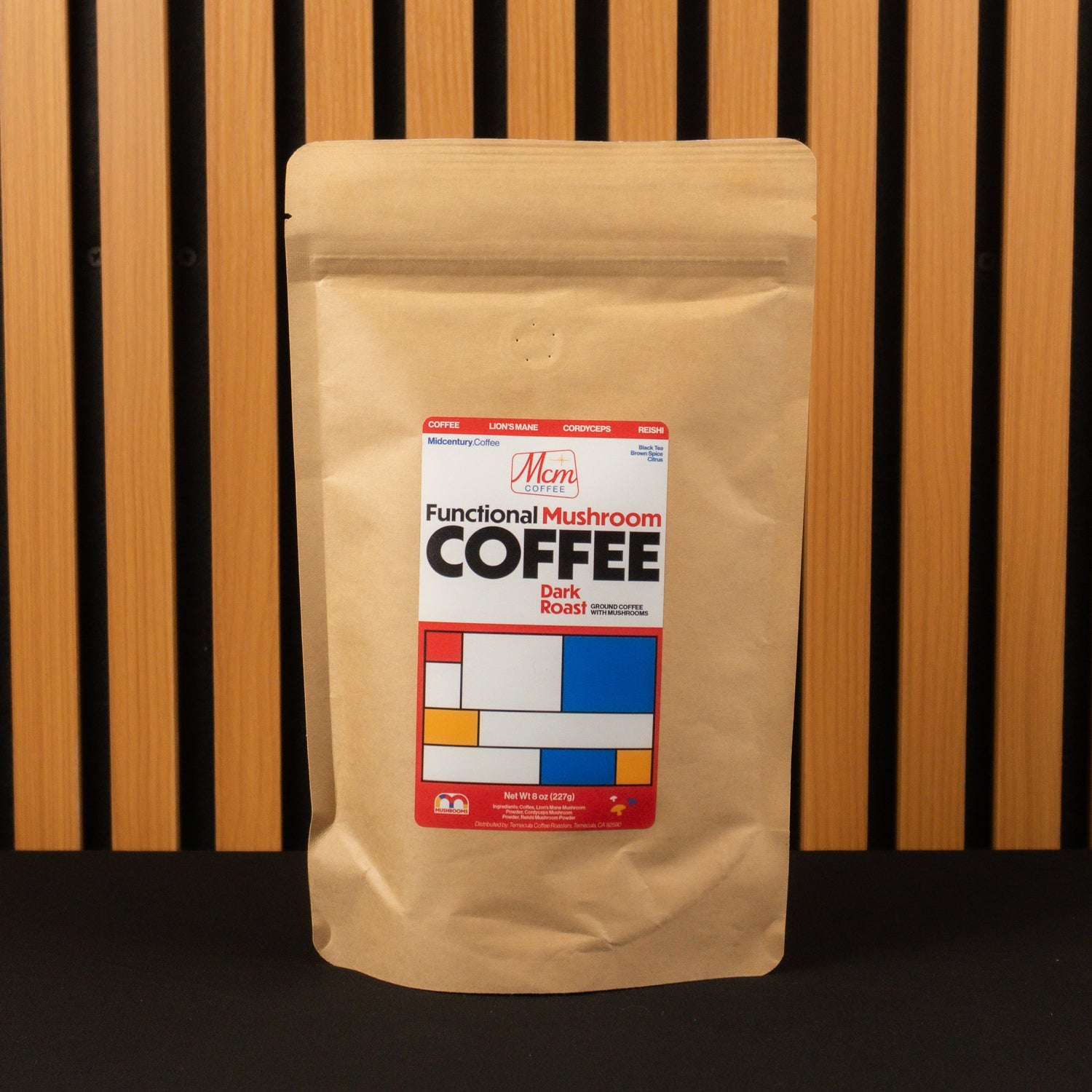 Mushroom Coffee package with a label on a wooden background