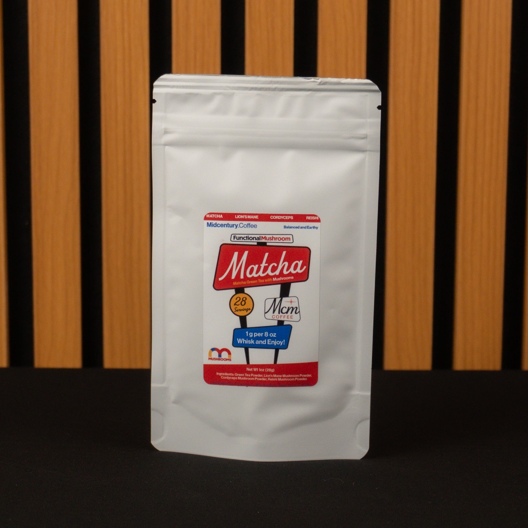 White matcha powder package with red label on a wooden background